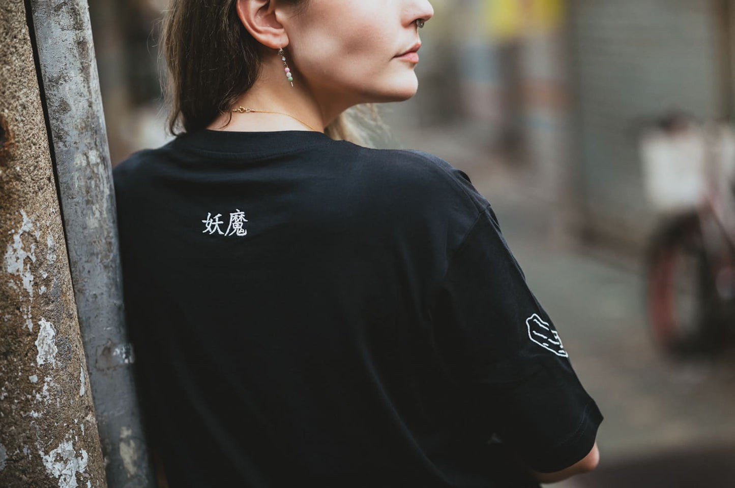 Zoom sur broderie Kappa tee shirt noir